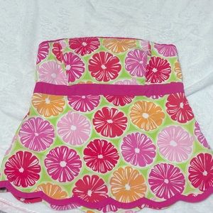 Cute strapless Lilly top. Pinks, orange, lime . Gently used, sweet details